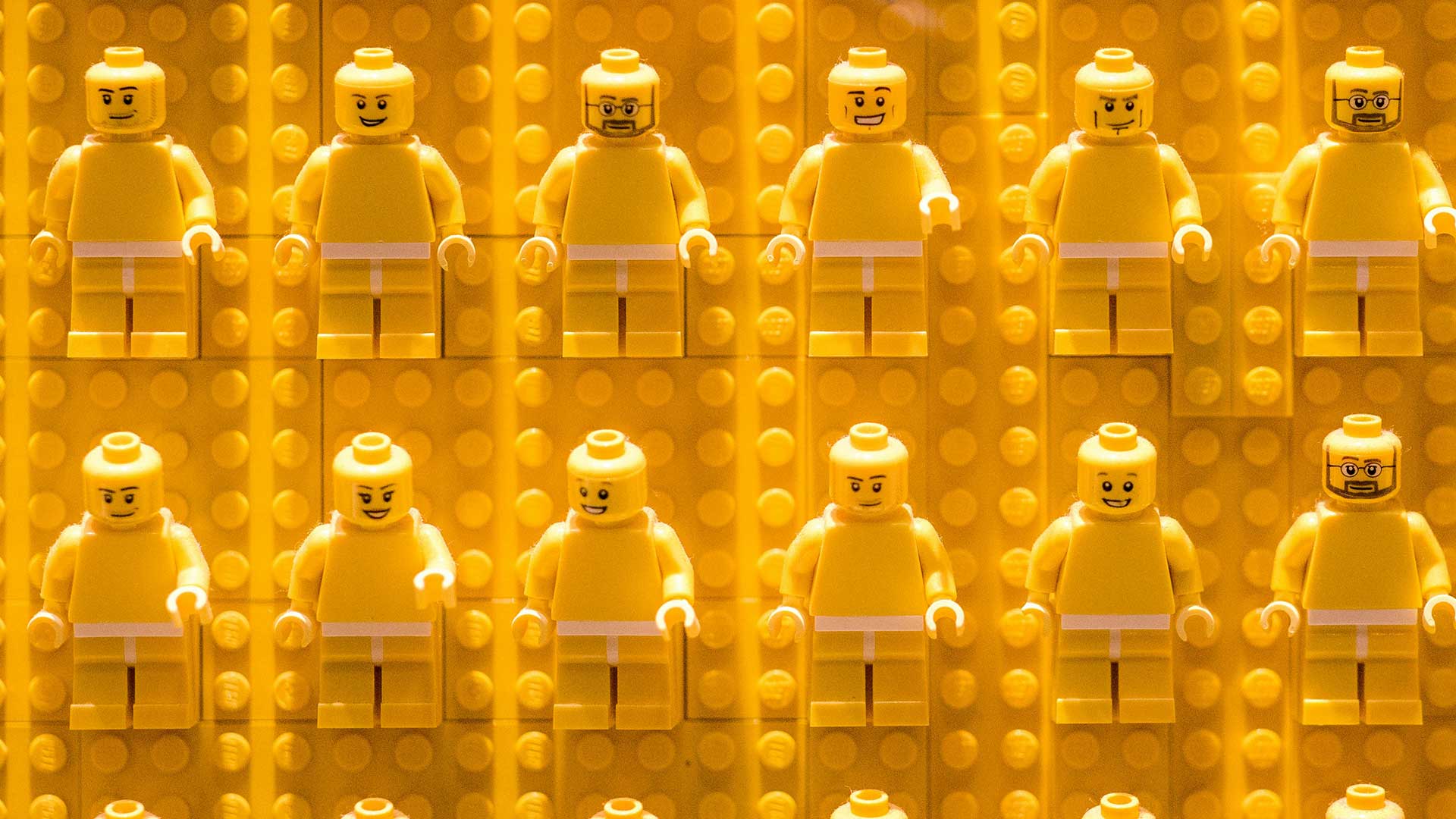 a collection of yellow LEGO minifigures.
