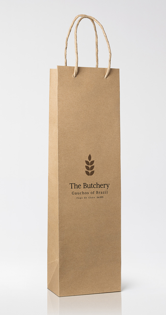 Elegant yet intentional retail packaging design extends the brand into the takeaway moment, layering texture, storytelling, and sophistication into every guest touchpoint.